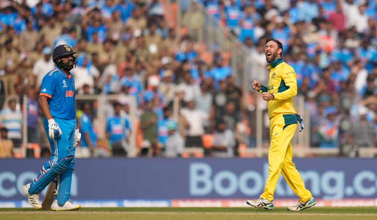 Glenn Maxwell celebrates the wicket of Indian captain Rohit Sharma | AP